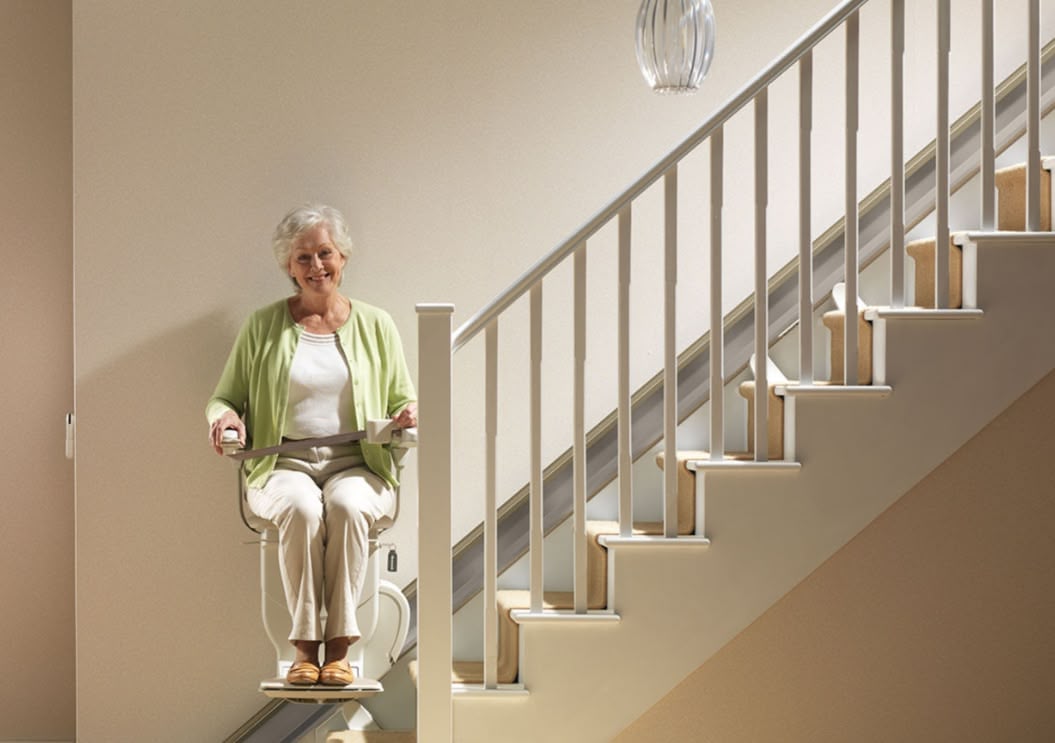 DJ facing a crowd at his deck. Photo with a purple hue